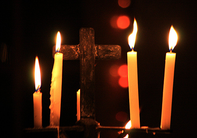 Candles by a cross